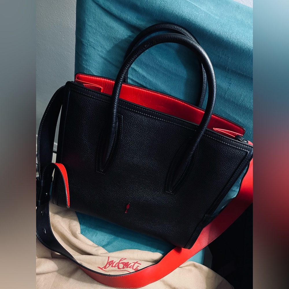 Used Christian Louboutin hand bag. No signs of ware.